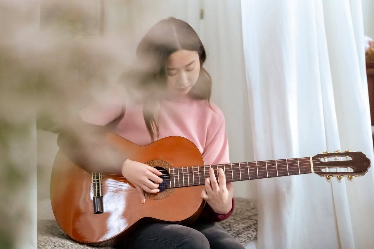 a-girl-playing-guitar