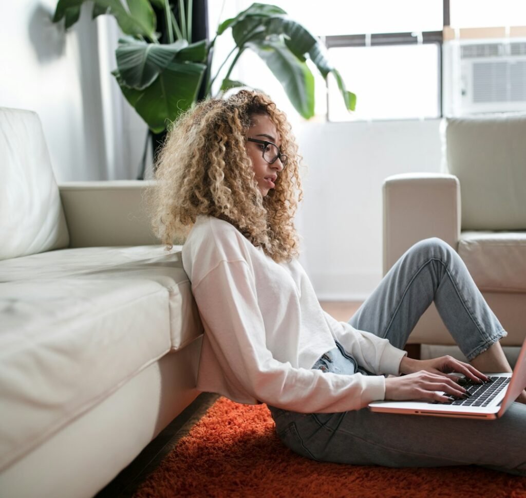 Woman working comfortably from home on a laptop